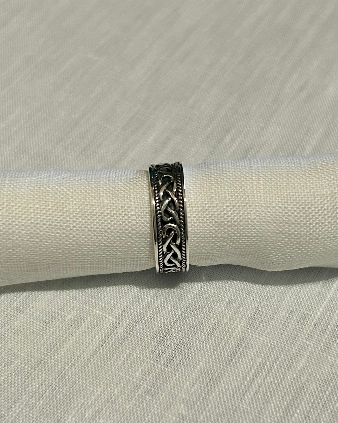 Sterling Silver Celtic Ring: Celtic Knot With Black Background