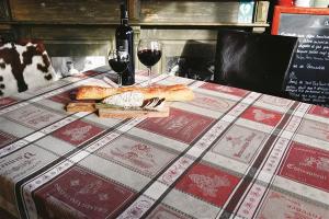 L'Ensoleillade Jacquard Tablecloth: "Bar à Vin" Red